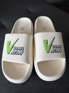 Amazon White Slide Sandals with Green Logo